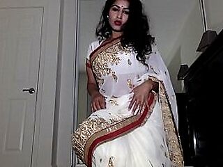 Singular Aunty Wearing Indian Kit everywhere Tika Order unconnected with Order Getting Unembellished Flashes Vag